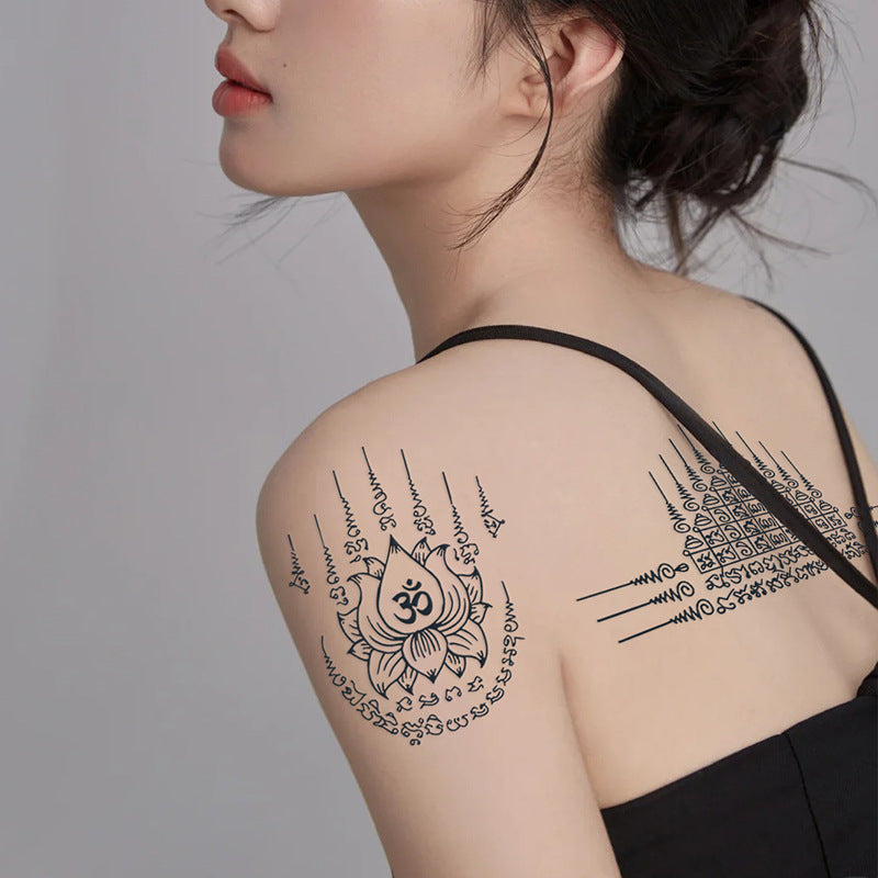 upper arm Ancient Amulets tattoo